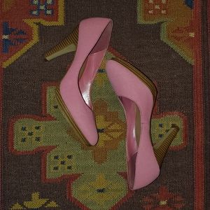 Pink round pointed toe heels